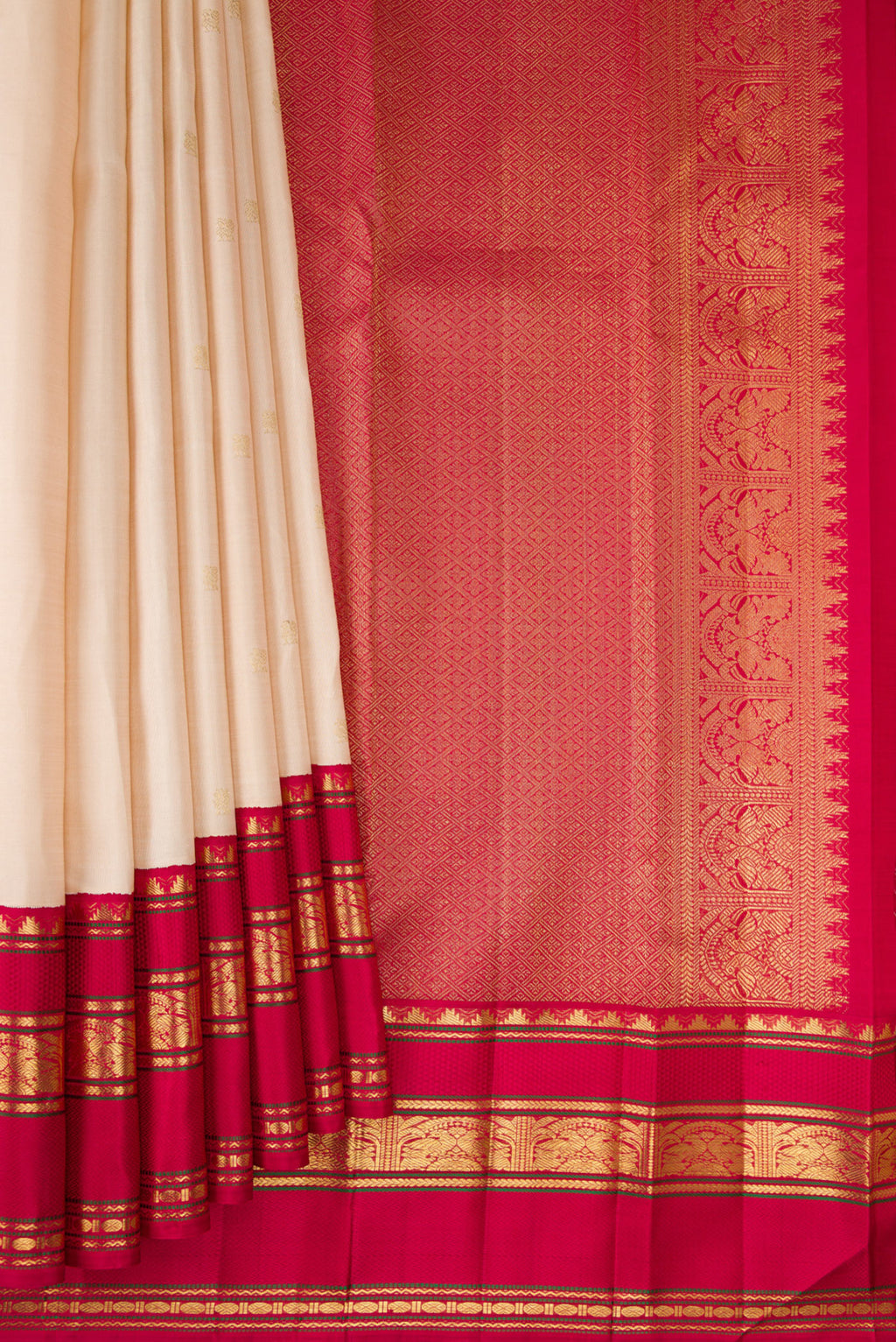 Pleats and pallu of Pure Silk Pure Zari Cream Dual Tone Kanjivaram Saree with Zari Butta on the body and Zari Border. 