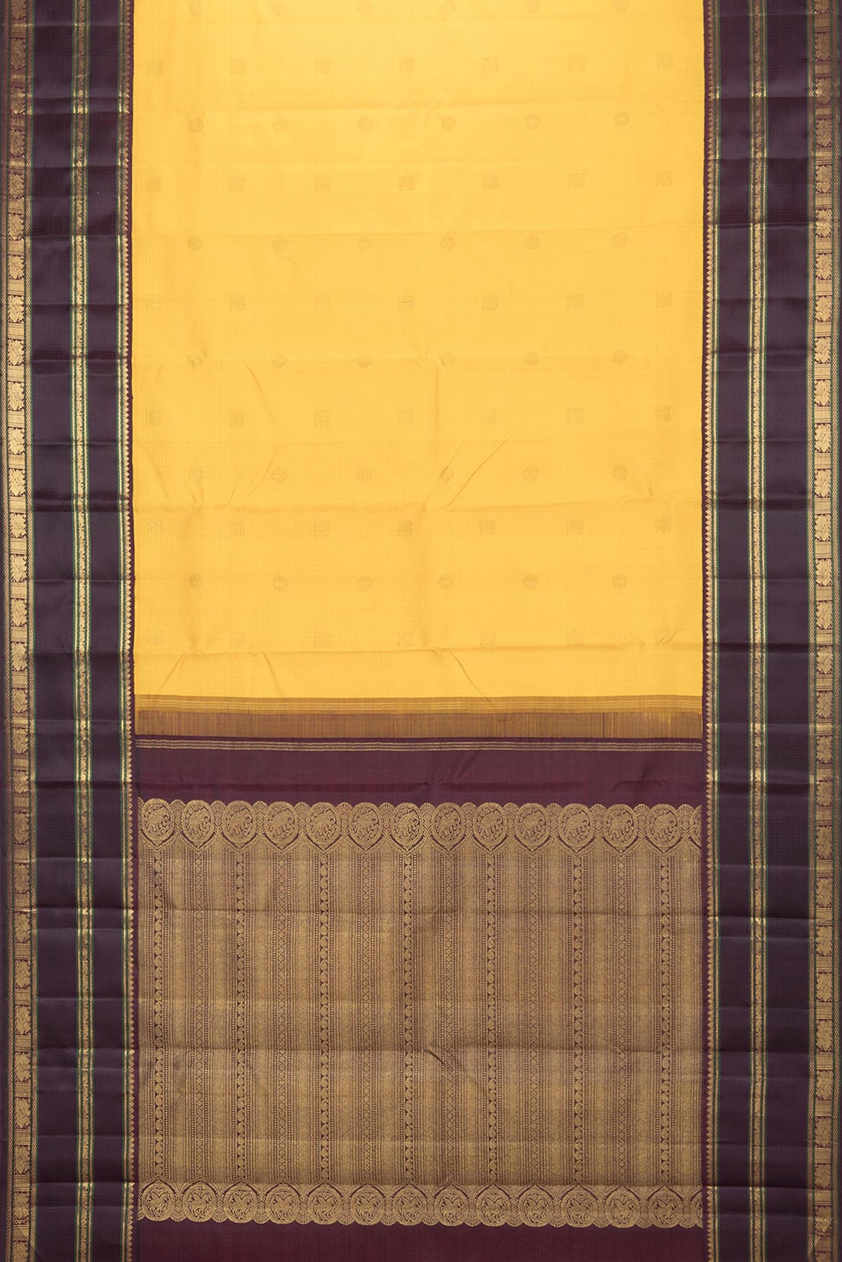 Flat view of Pure Silk Yellow Dual Tone Kanchipuram Saree with Checked design on the body and Zari Border. 