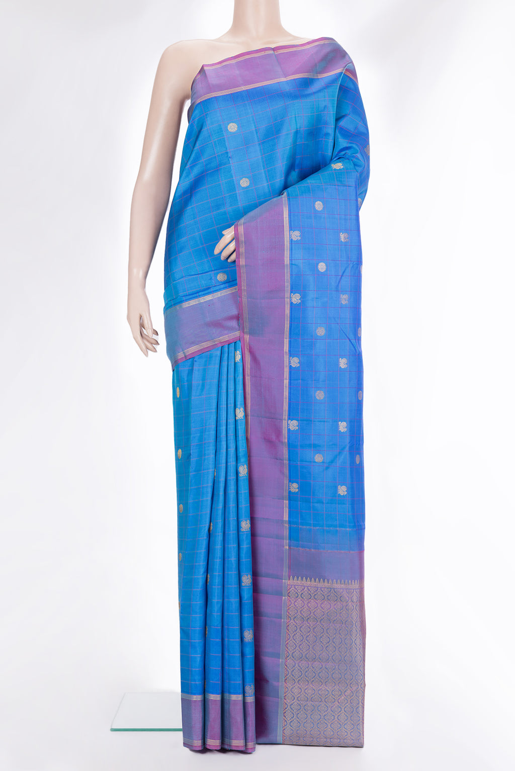 Pure Silk Royal Blue Dual Tone Kanchipuram Saree with Checked design on the body and Zari Border.  displayed on a mannequin