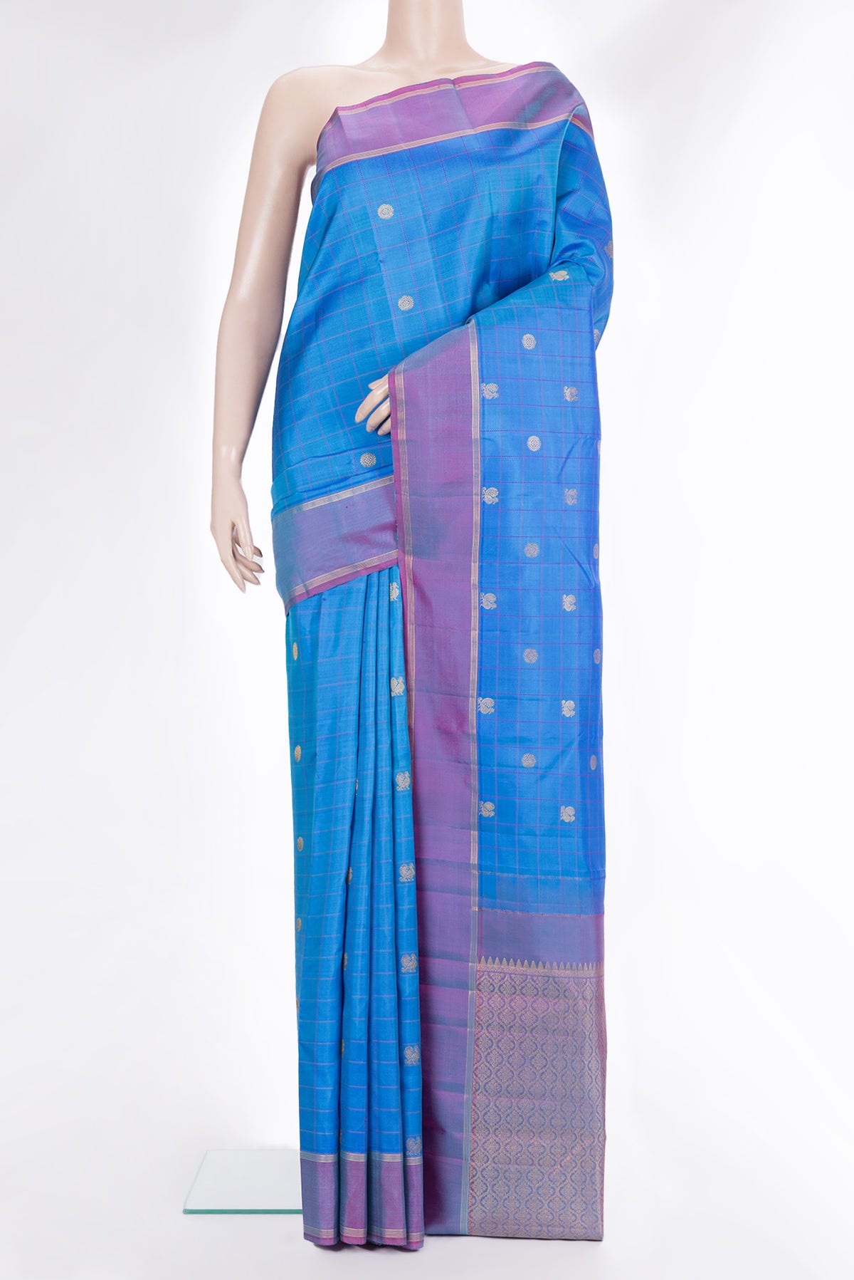 Pure Silk Royal Blue Dual Tone Kanchipuram Saree with Checked design on the body and Zari Border.  displayed on a mannequin
