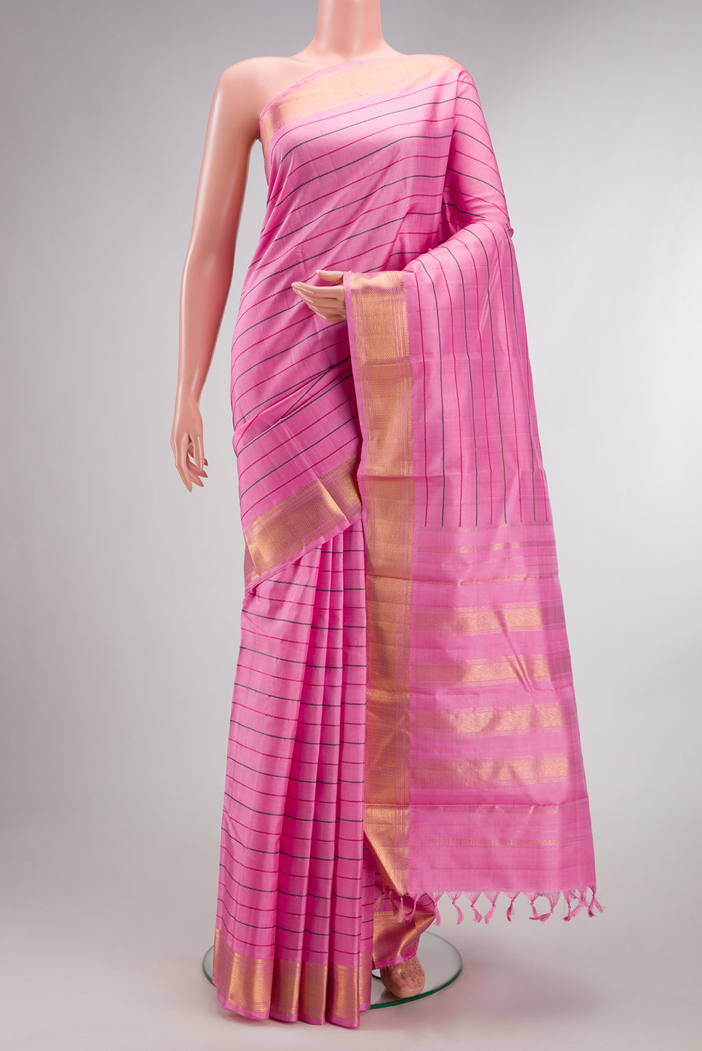 Pure Silk Rose pink Kanchipuram Saree with Veldhari on the body and Zari Border.  displayed on a mannequin