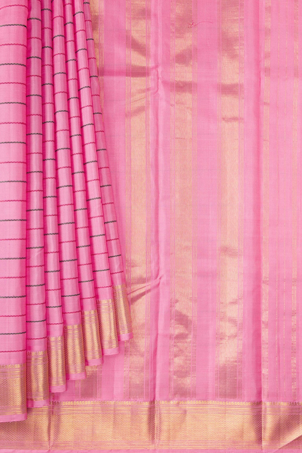 Pleats and pallu of Pure Silk Rose pink Kanchipuram Saree with Veldhari on the body and Zari Border. 