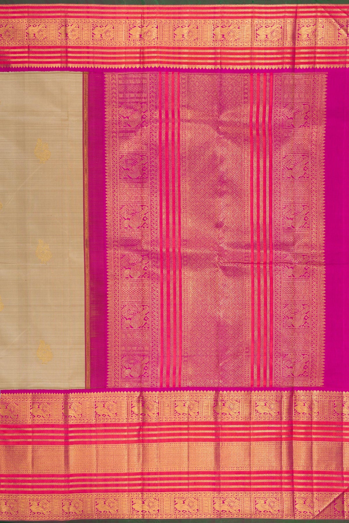 Close up image of the pallu of Pure Silk Pure Zari Dark Beige Kanchipuram Saree with Zari Butta on the body and Zari Border. 