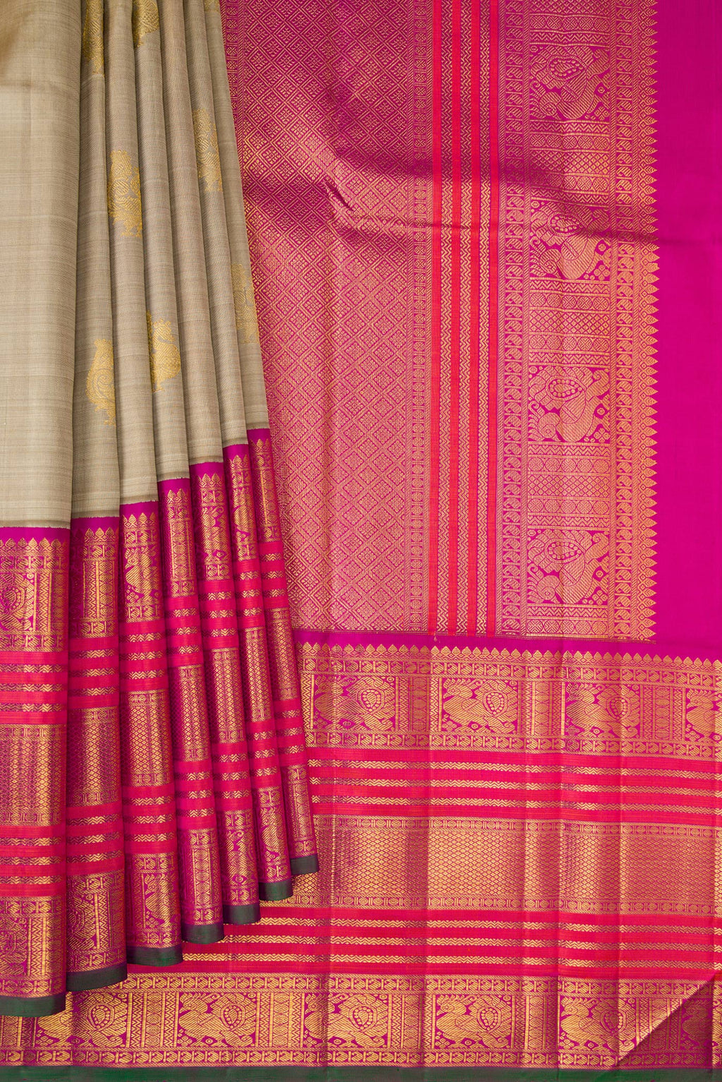 Pleats and pallu of Pure Silk Pure Zari Dark Beige Kanchipuram Saree with Zari Butta on the body and Zari Border. 