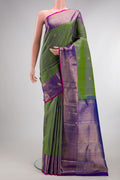 Pure Silk Pure Zari Green Kanchipuram Saree with Zari Butta on the body and Zari Border.  displayed on a mannequin