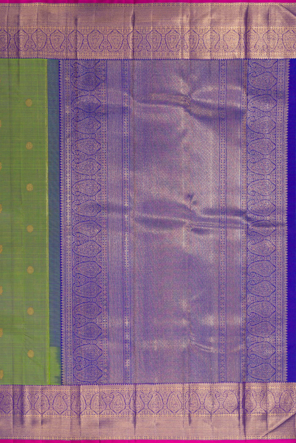 Close up image of the pallu of Pure Silk Pure Zari Green Kanchipuram Saree with Zari Butta on the body and Zari Border. 