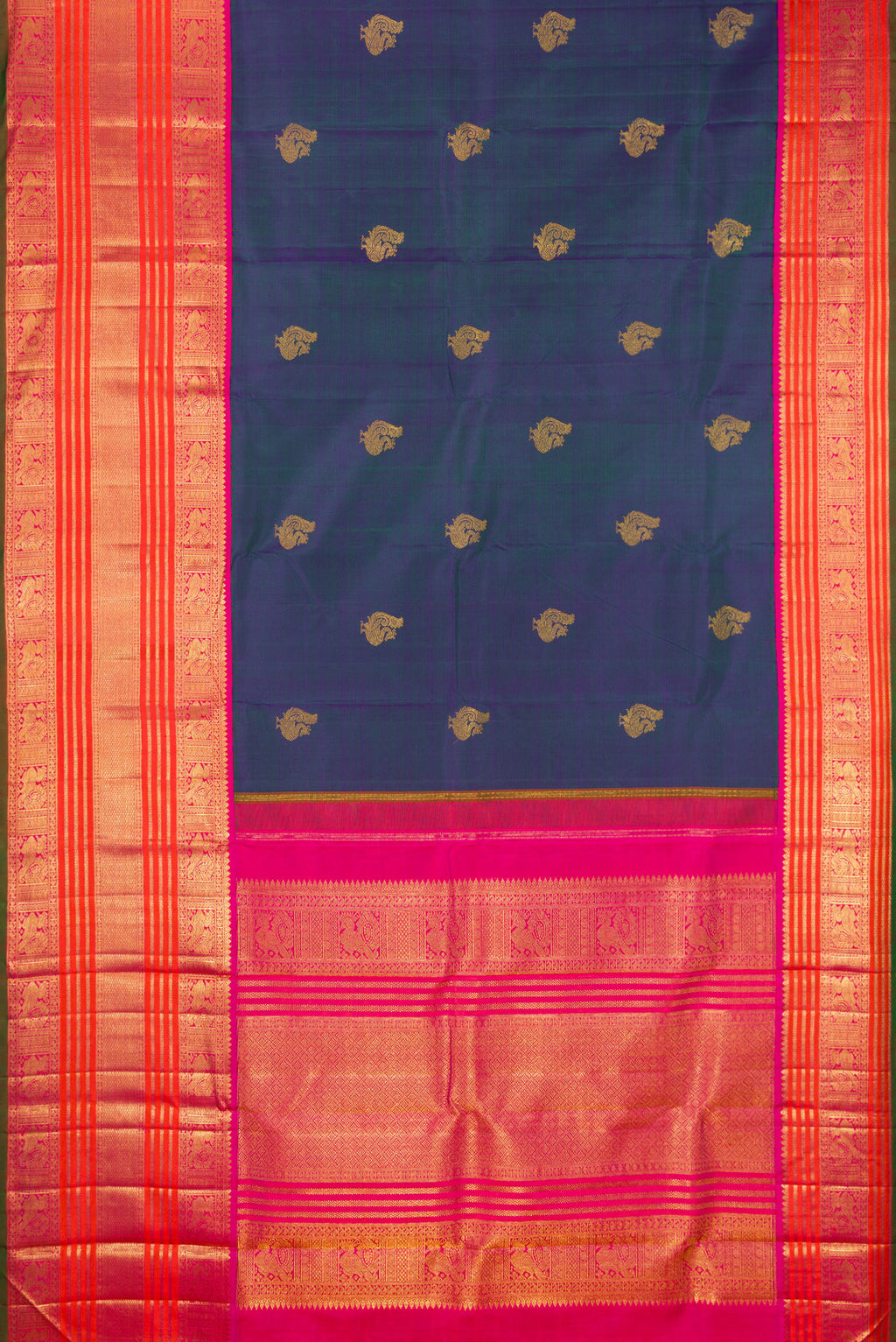 Flat view of Pure Silk Pure Zari Peacock Blue Dual Tone Kanchipuram Saree with Zari Butta on the body and Zari Border. 
