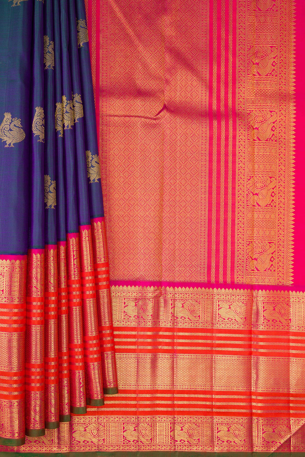 Pleats and pallu of Pure Silk Pure Zari Peacock Blue Dual Tone Kanchipuram Saree with Zari Butta on the body and Zari Border. 