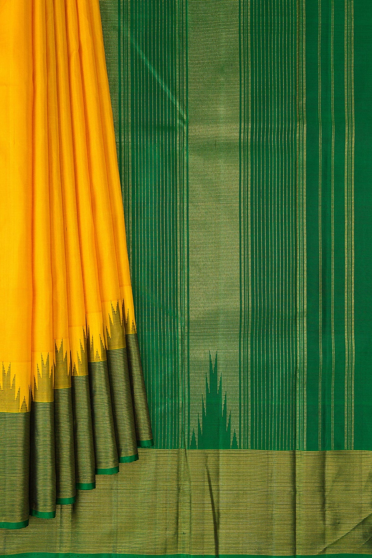 Pleats and pallu of Pure Silk Yellow Kanjivaram Saree with Plain Body and Temple Border. 