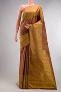 Pure Silk Brown Kanchipuram Saree with Stripes on the body and Fancy Border.  displayed on a mannequin
