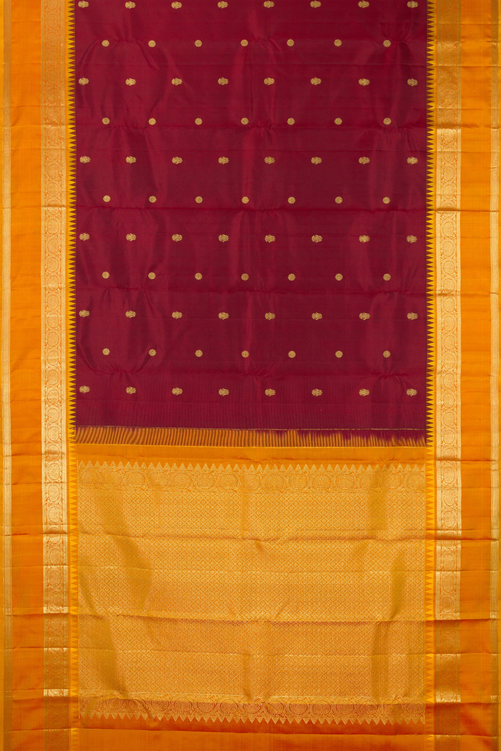 Flat view of Pure Silk Maroon Kanjivaram Saree with Zari Butta on the body and Zari Border. 