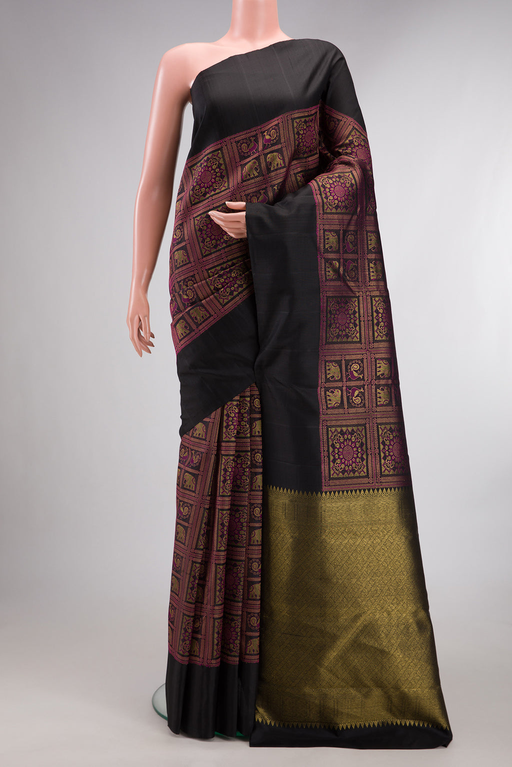 Pure Silk Black Dual Tone Kanjivaram Saree with Zari Brocade on the body and Plain Border.  displayed on a mannequin