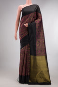 Pure Silk Black Dual Tone Kanjivaram Saree with Zari Brocade on the body and Plain Border.  displayed on a mannequin