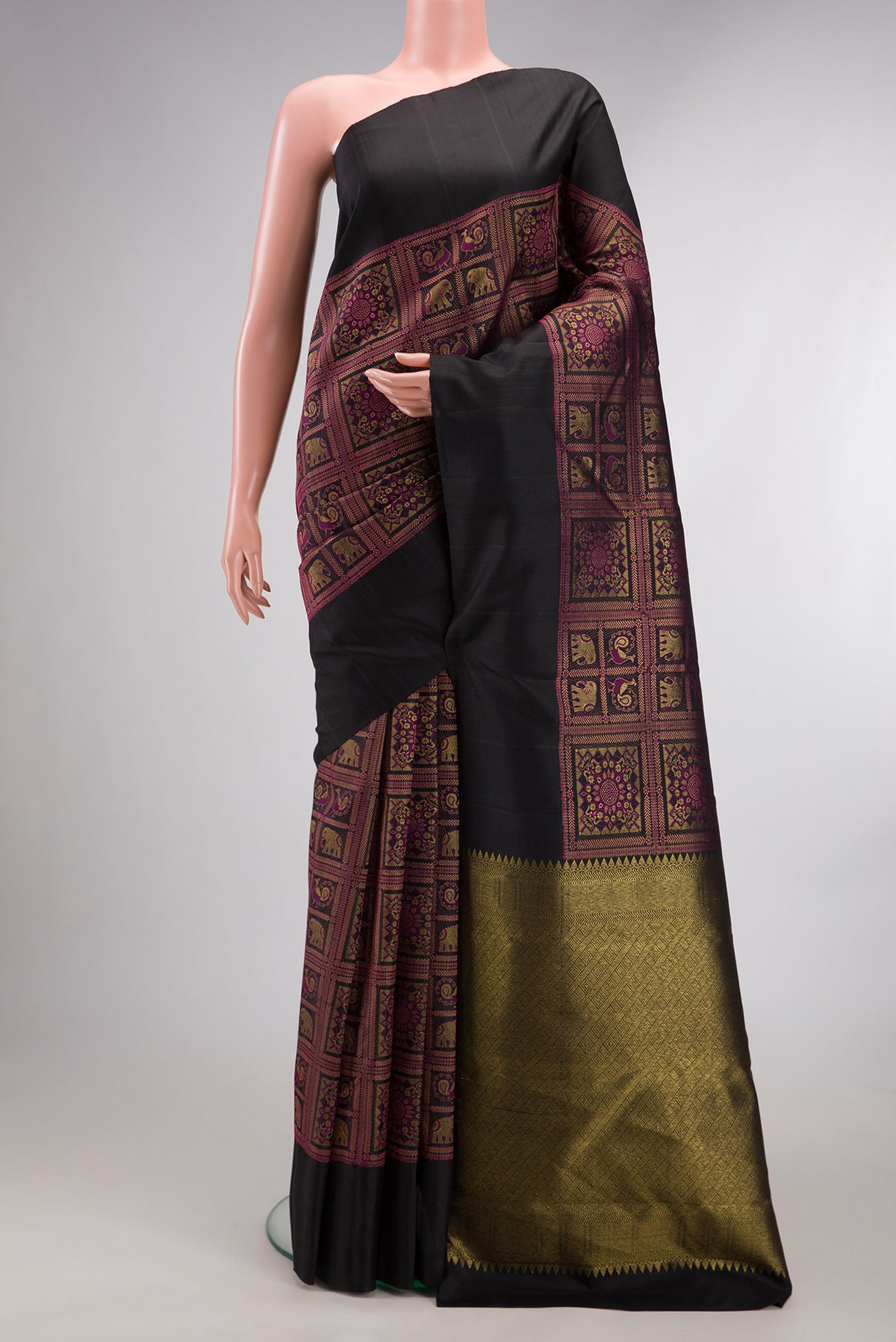 Pure Silk Black Dual Tone Kanjivaram Saree with Zari Brocade on the body and Plain Border.  displayed on a mannequin