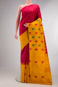 Pure Silk Red Kanjivaram Saree with Checked design on the body and Fancy Border.  displayed on a mannequin