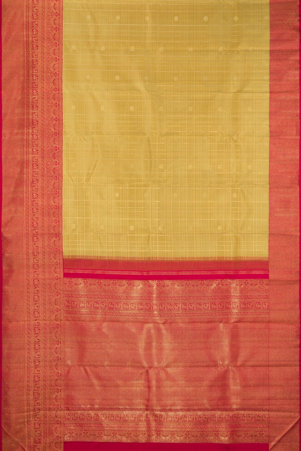 Flat view of Pure Silk Pure Zari Gold Dual Tone Kanjivaram Saree with Zari Butta on the body and Zari Border. 