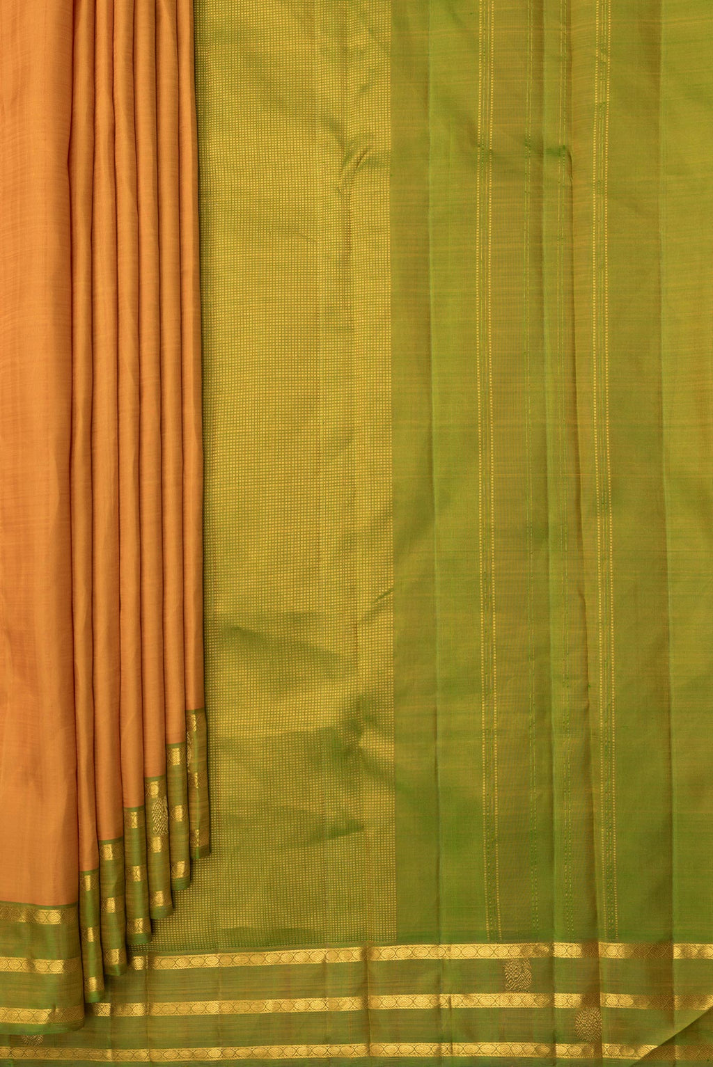 Pleats and pallu of Pure Silk Mustard Dual Tone Kanchipuram Saree with Plain Body and Zari Border. 