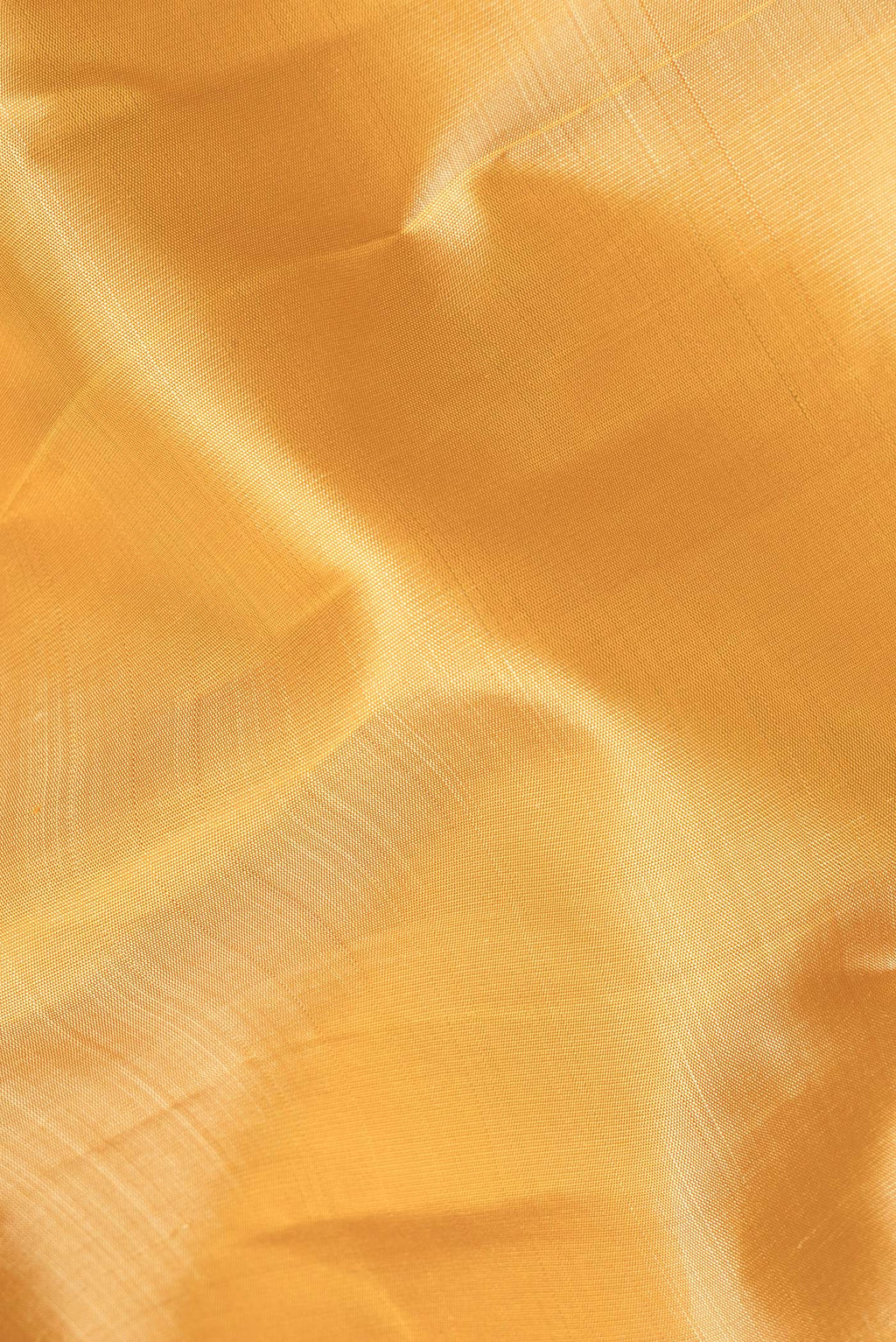 Close up of Pure Silk Sandal Dual Tone Kanjivaram Saree with Plain Body and Zari Border.  displaying folds