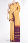 Pure Silk Sandal Dual Tone Kanjivaram Saree with Plain Body and Zari Border.  displayed on a mannequin
