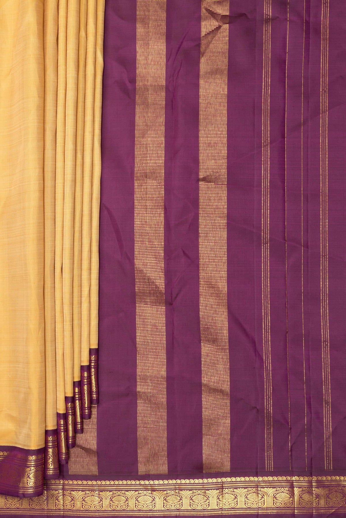 Pleats and pallu of Pure Silk Sandal Dual Tone Kanjivaram Saree with Plain Body and Zari Border. 