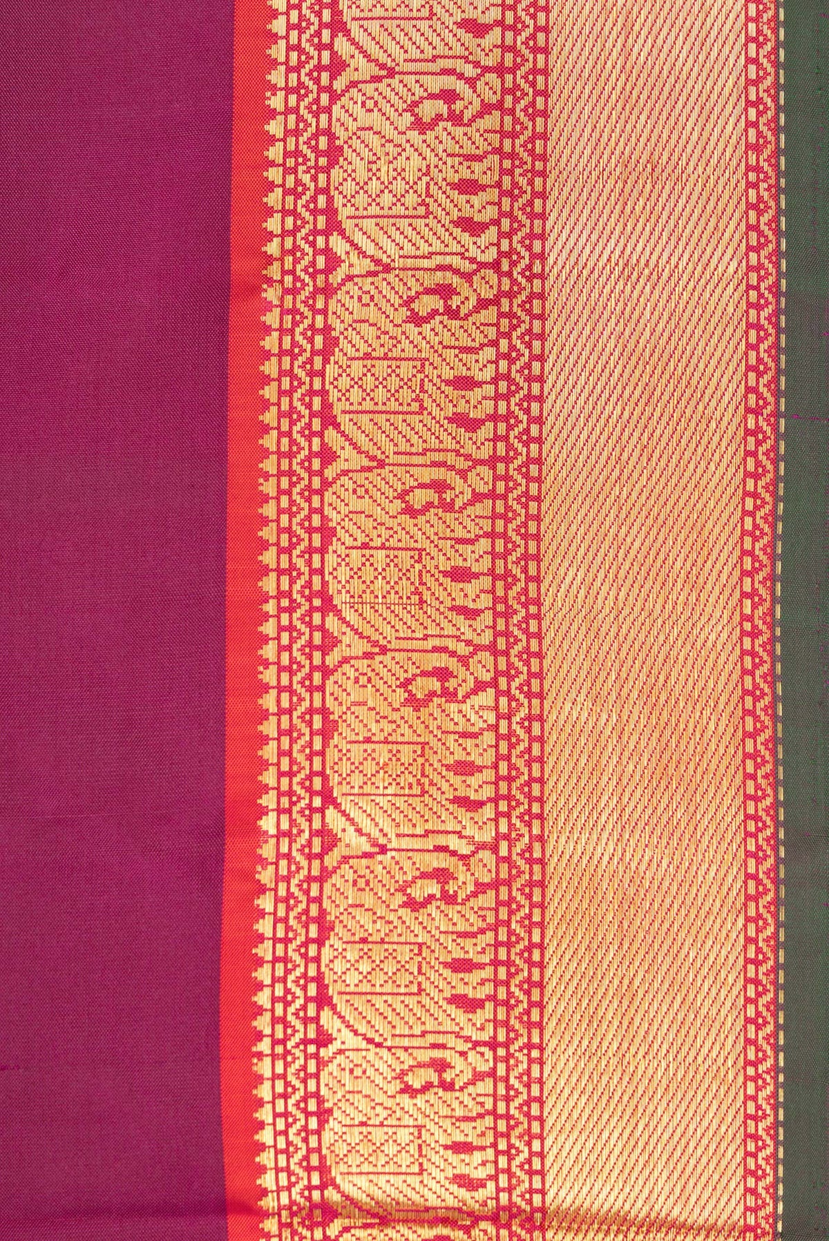 Border image of Pure Silk Magenta Dual Tone Kanchipuram Saree with Plain Body and Zari Border. 