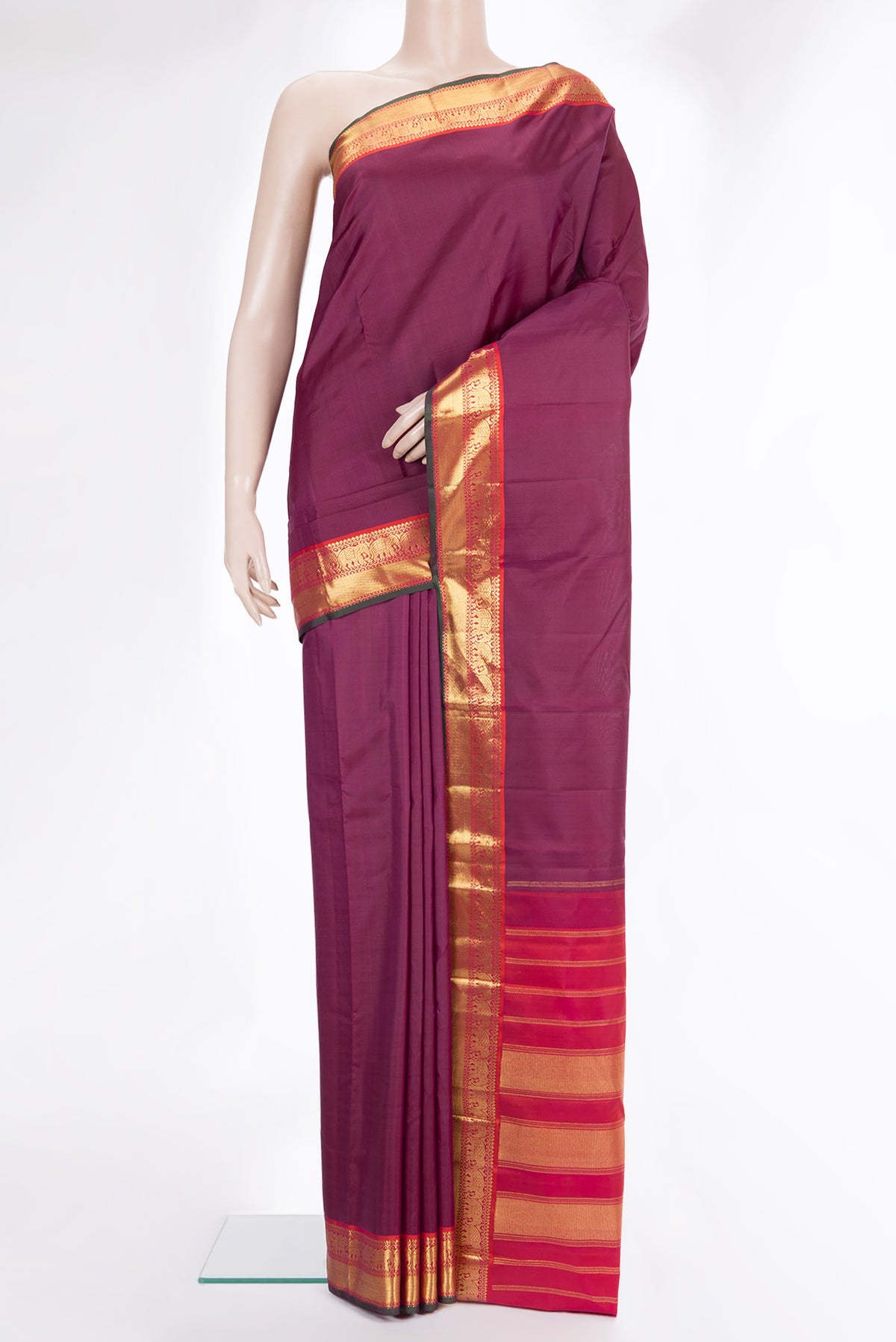 Pure Silk Magenta Dual Tone Kanchipuram Saree with Plain Body and Zari Border.  displayed on a mannequin