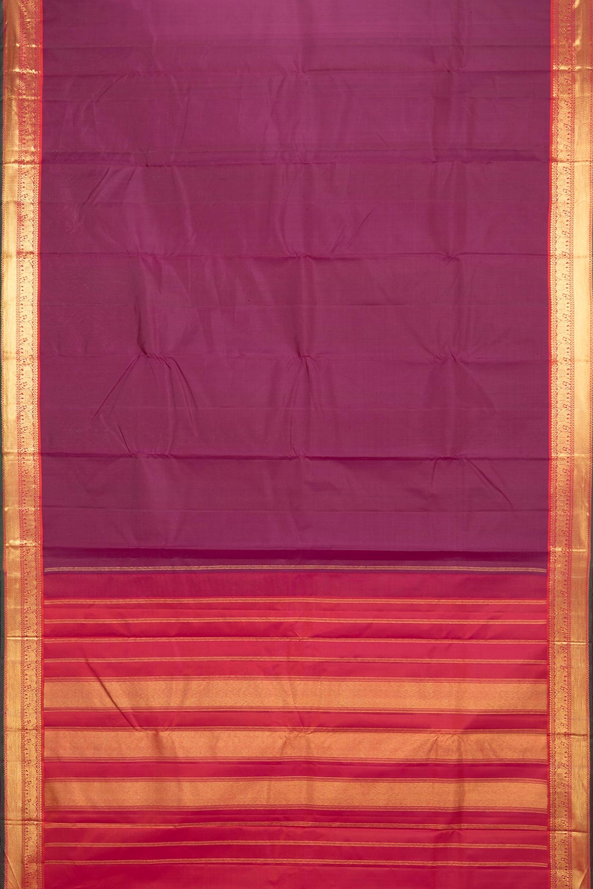 Flat view of Pure Silk Magenta Dual Tone Kanchipuram Saree with Plain Body and Zari Border. 