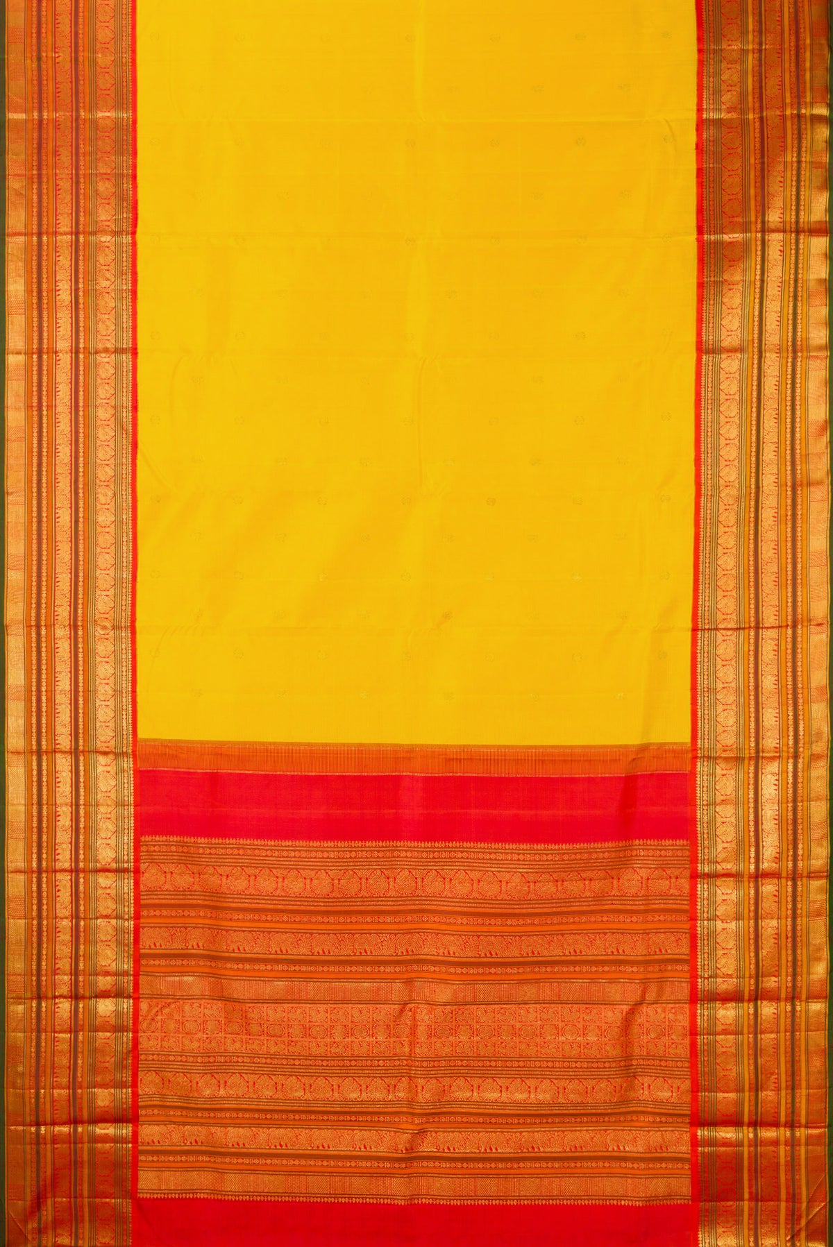 Flat view of Pure Silk Yellow Kanchipuram Saree with Zari Butta on the body and Zari Border. 