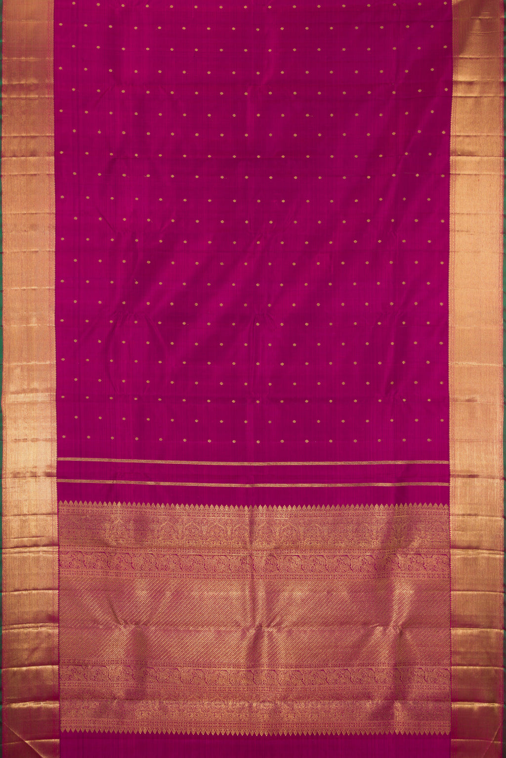 Flat view of Pure Silk Pure Zari Magenta Kanjivaram Saree with Zari Butta on the body and Zari Border. 