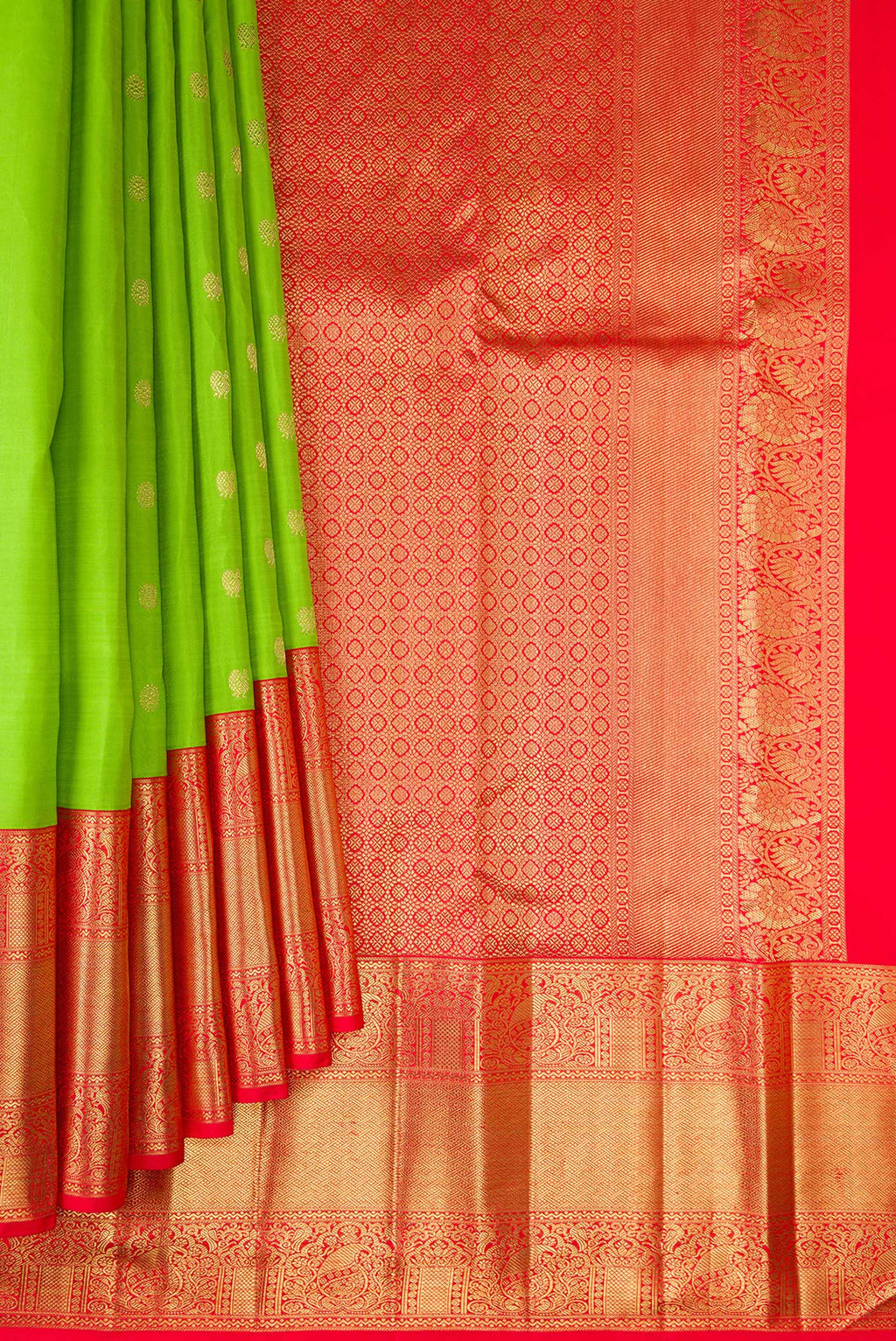 Pleats and pallu of Pure Silk Pure Zari Parrot Green Dual Tone Kanjivaram Saree with Zari Butta on the body and Zari Border. 