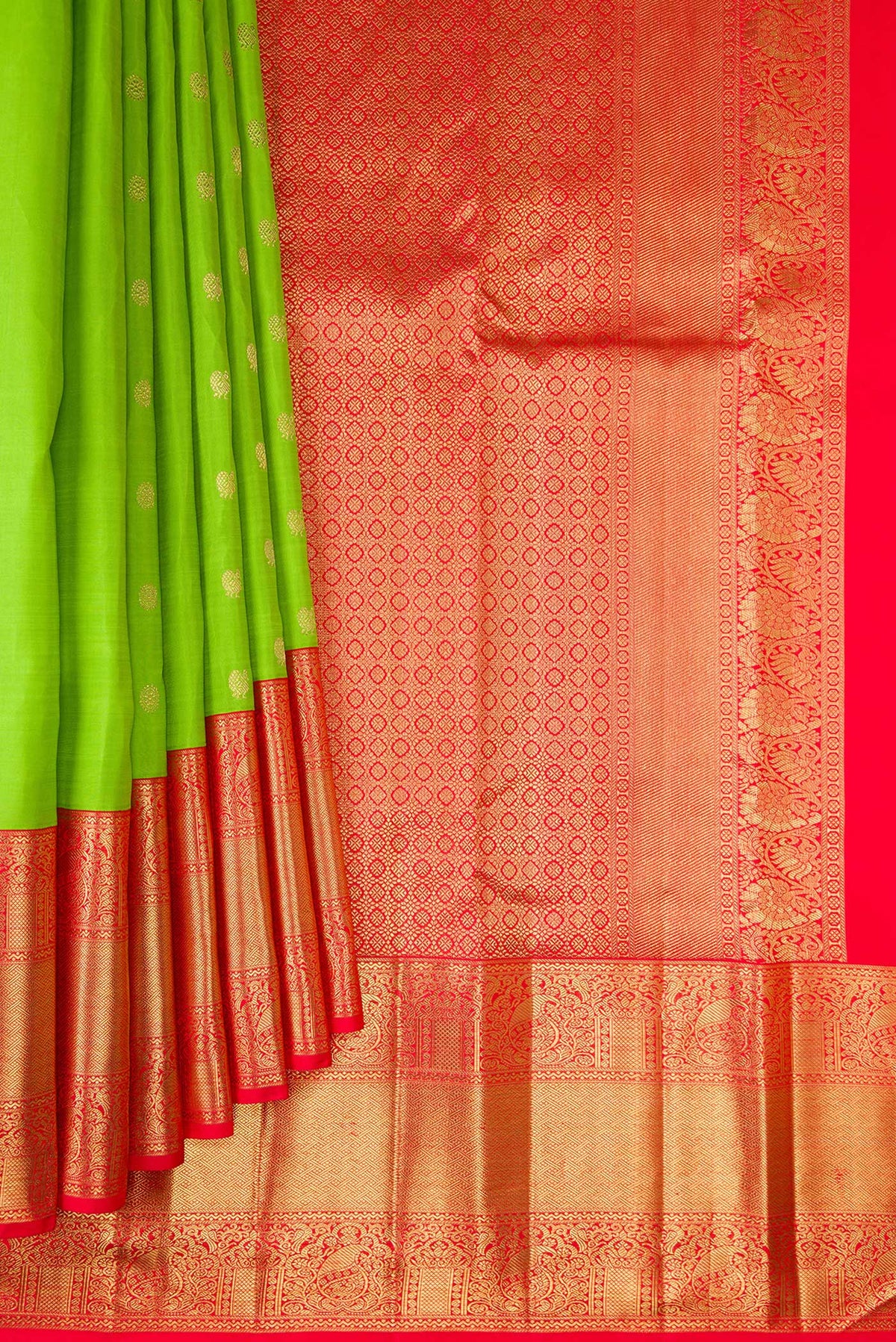 Pleats and pallu of Pure Silk Pure Zari Parrot Green Dual Tone Kanjivaram Saree with Zari Butta on the body and Zari Border. 