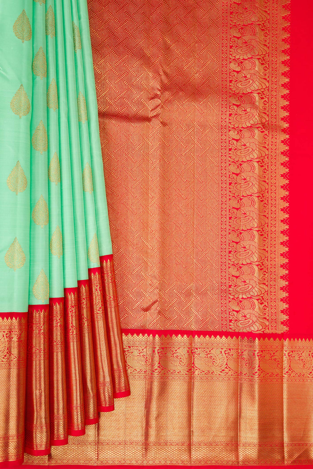 Pleats and pallu of Pure Silk Pure Zari Sea Green Kanjivaram Saree with Zari Butta on the body and Zari Border. 