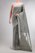 Pure Silk Pure Zari Grey Dual Tone Kanchipuram Saree with Plain Body and Fancy Border.  displayed on a mannequin