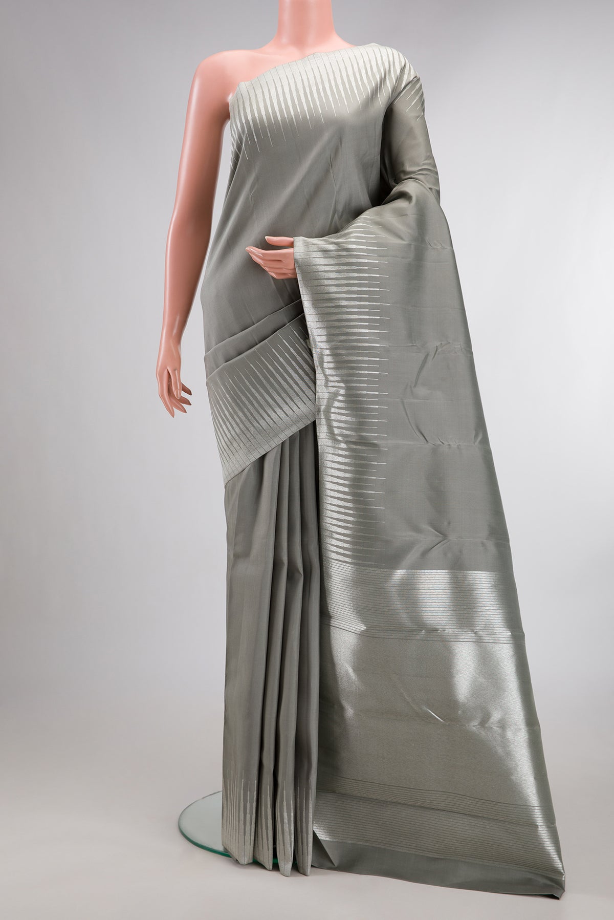 Pure Silk Pure Zari Grey Dual Tone Kanchipuram Saree with Plain Body and Fancy Border.  displayed on a mannequin