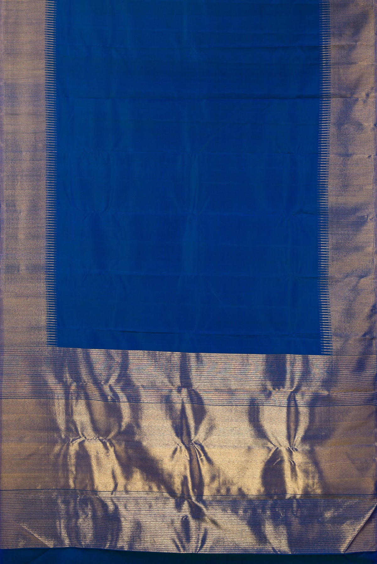 Flat view of Pure Silk Blue Kanchipuram Saree with Plain Body and Zari Border. 