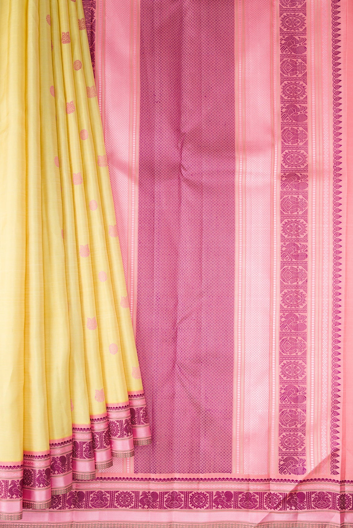 Pleats and pallu of Pure Silk Sandal Kanjivaram Saree with Thread Butta on the body and Thread Border. 