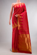 Pure Silk Red Kanjivaram Saree with Checked design on the body and Temple Border.  displayed on a mannequin