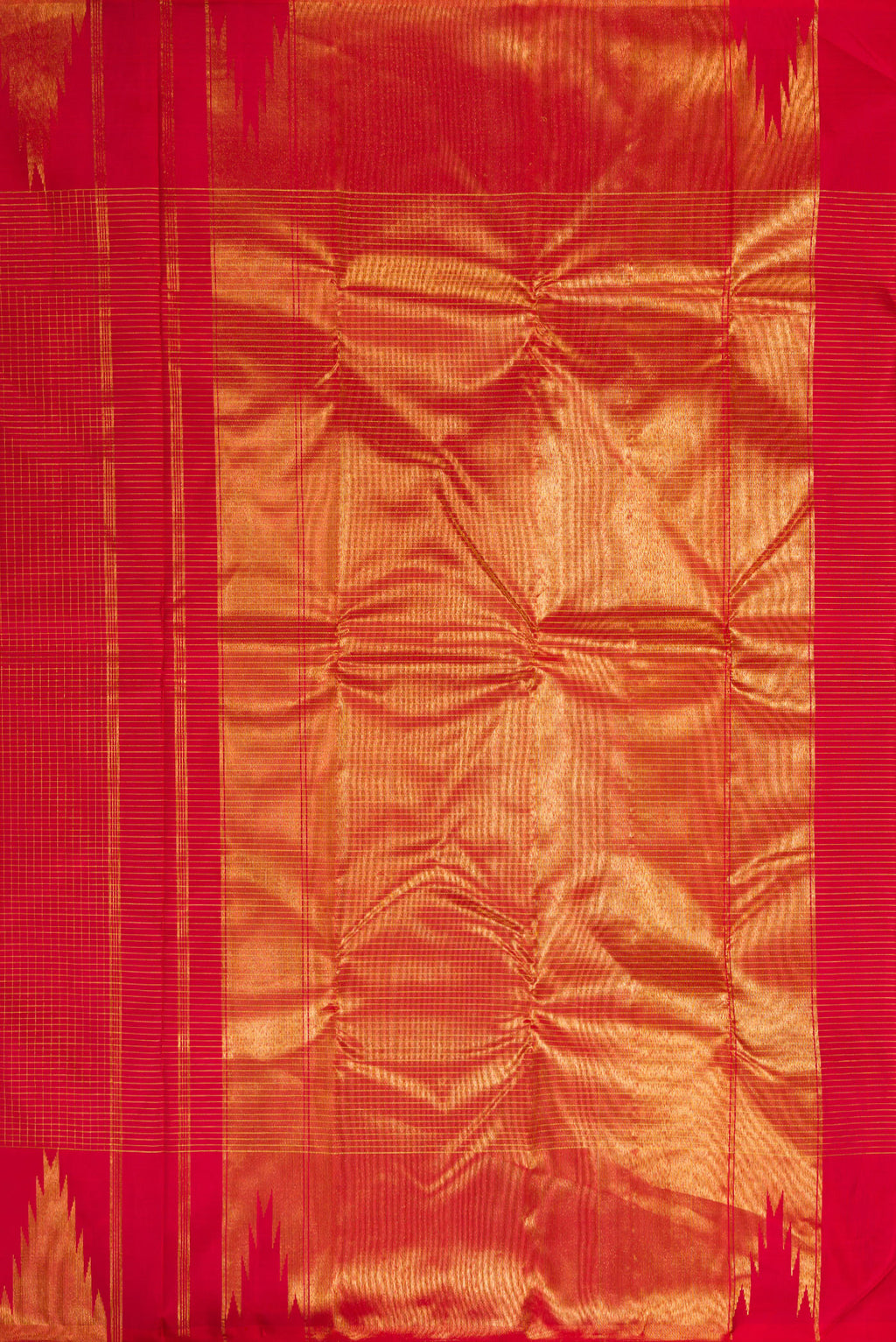 Close up image of the pallu of Pure Silk Red Kanjivaram Saree with Checked design on the body and Temple Border. 