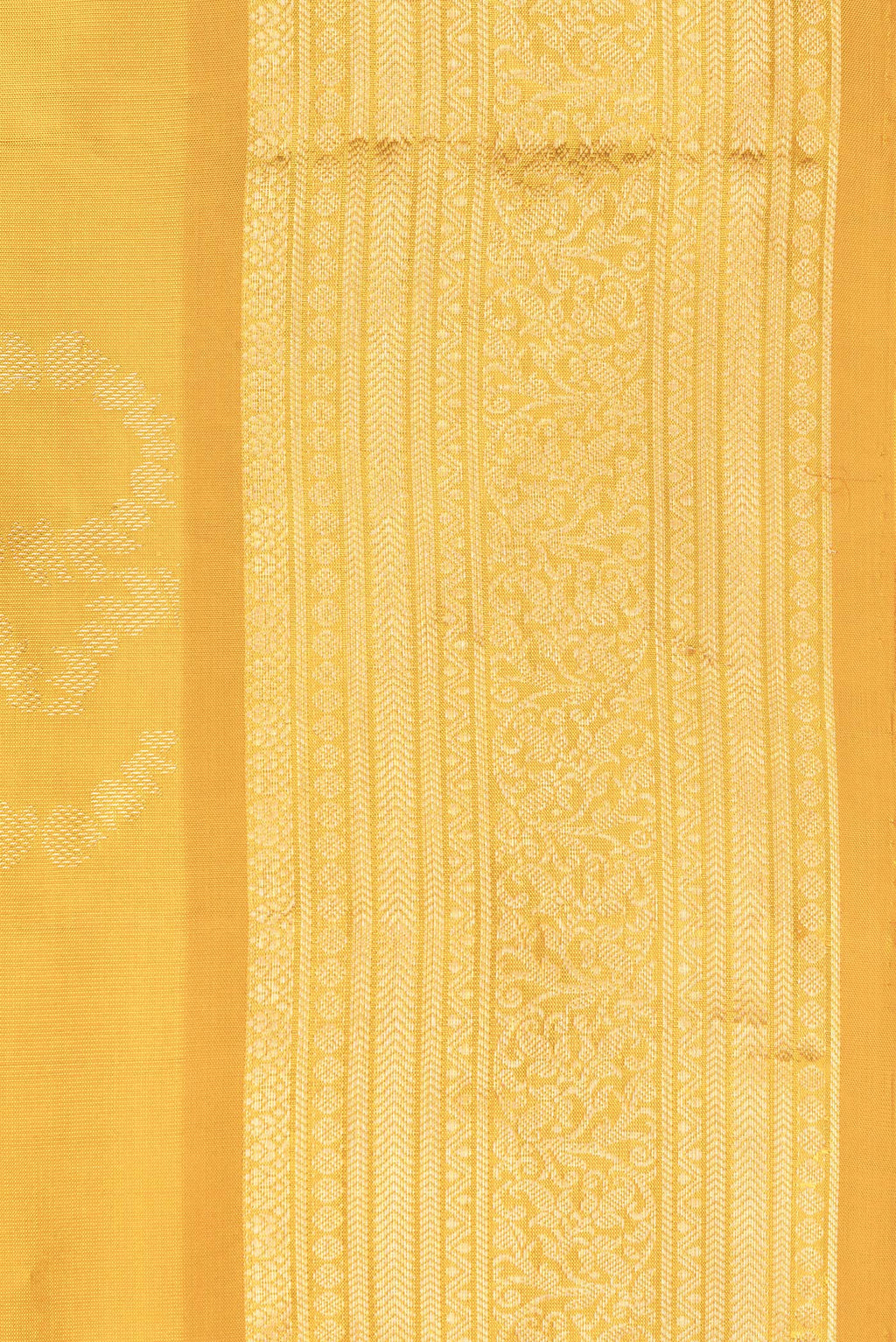 Border image of Pure Silk Mustard Dual Tone Soft Saree with Zari Butta on the body and Zari Border. 