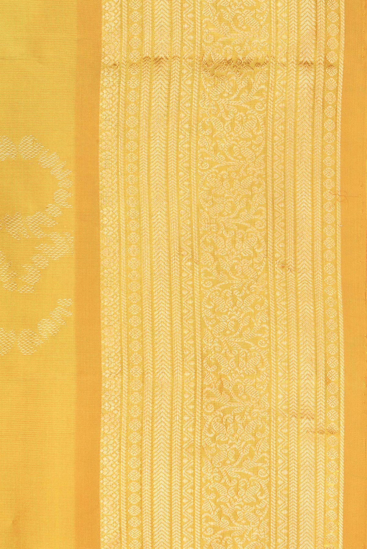 Border image of Pure Silk Mustard Dual Tone Soft Saree with Zari Butta on the body and Zari Border. 
