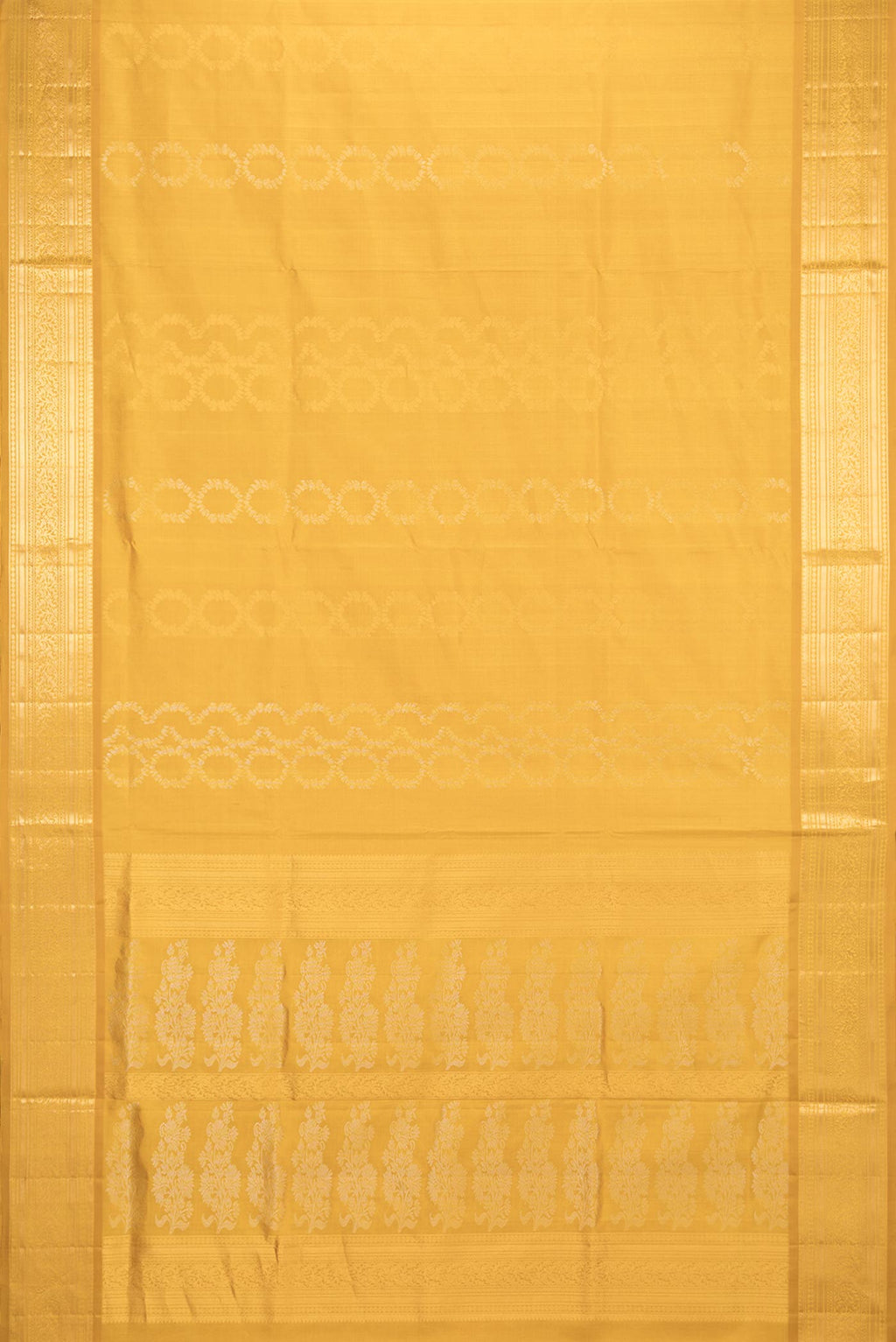 Flat view of Pure Silk Mustard Dual Tone Soft Saree with Zari Butta on the body and Zari Border. 