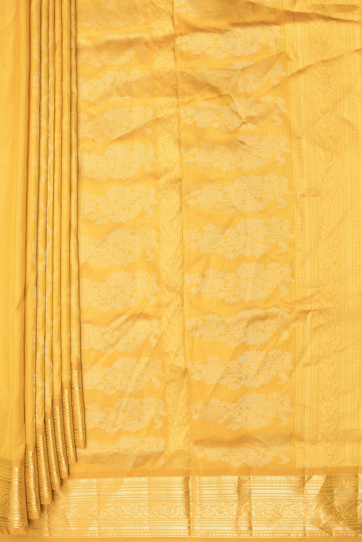 Pleats and pallu of Pure Silk Mustard Dual Tone Soft Saree with Zari Butta on the body and Zari Border. 