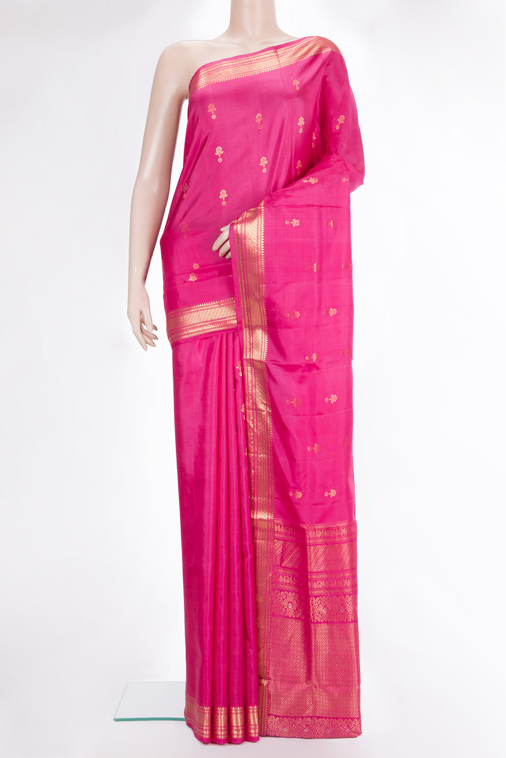 Pure Silk Pink Dual Tone Soft Saree with Zari Butta on the body and Zari Border.  displayed on a mannequin