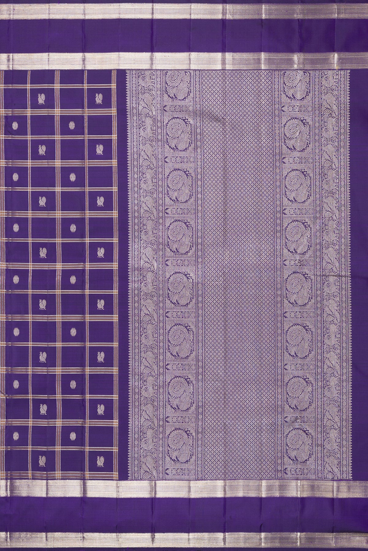Close up image of the pallu of Pure Silk Violet Kanchipuram Saree with Checked design on the body and Zari Border. 