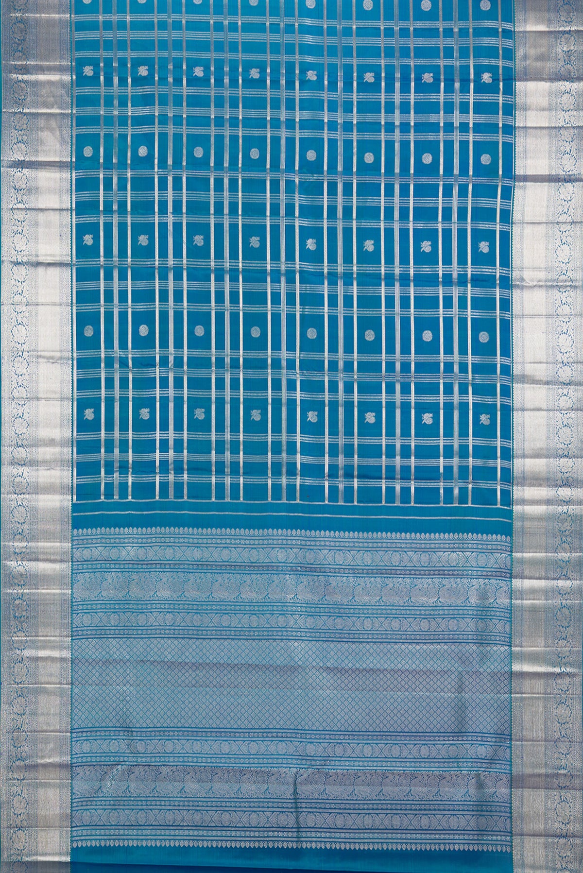 Flat view of Pure Silk Peacock Blue Dual Tone Kanchipuram Saree with Checked design on the body and Zari Border. 