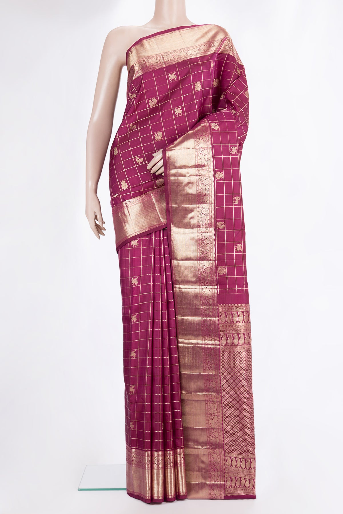 Pure Silk Magenta Dual Tone Kanchipuram Saree with Checked design on the body and Zari Border.  displayed on a mannequin