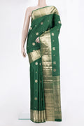 Pure Silk Bottle Green Kanjivaram Saree with Zari Butta on the body and Zari Border.  displayed on a mannequin