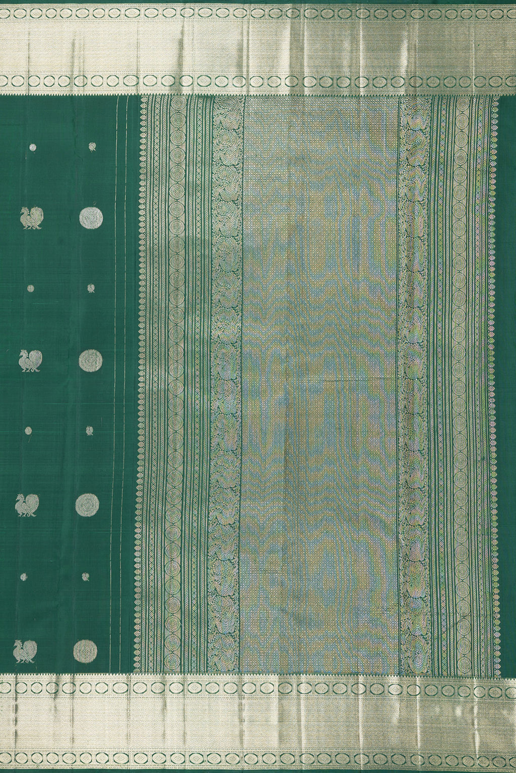 Close up image of the pallu of Pure Silk Bottle Green Kanjivaram Saree with Zari Butta on the body and Zari Border. 