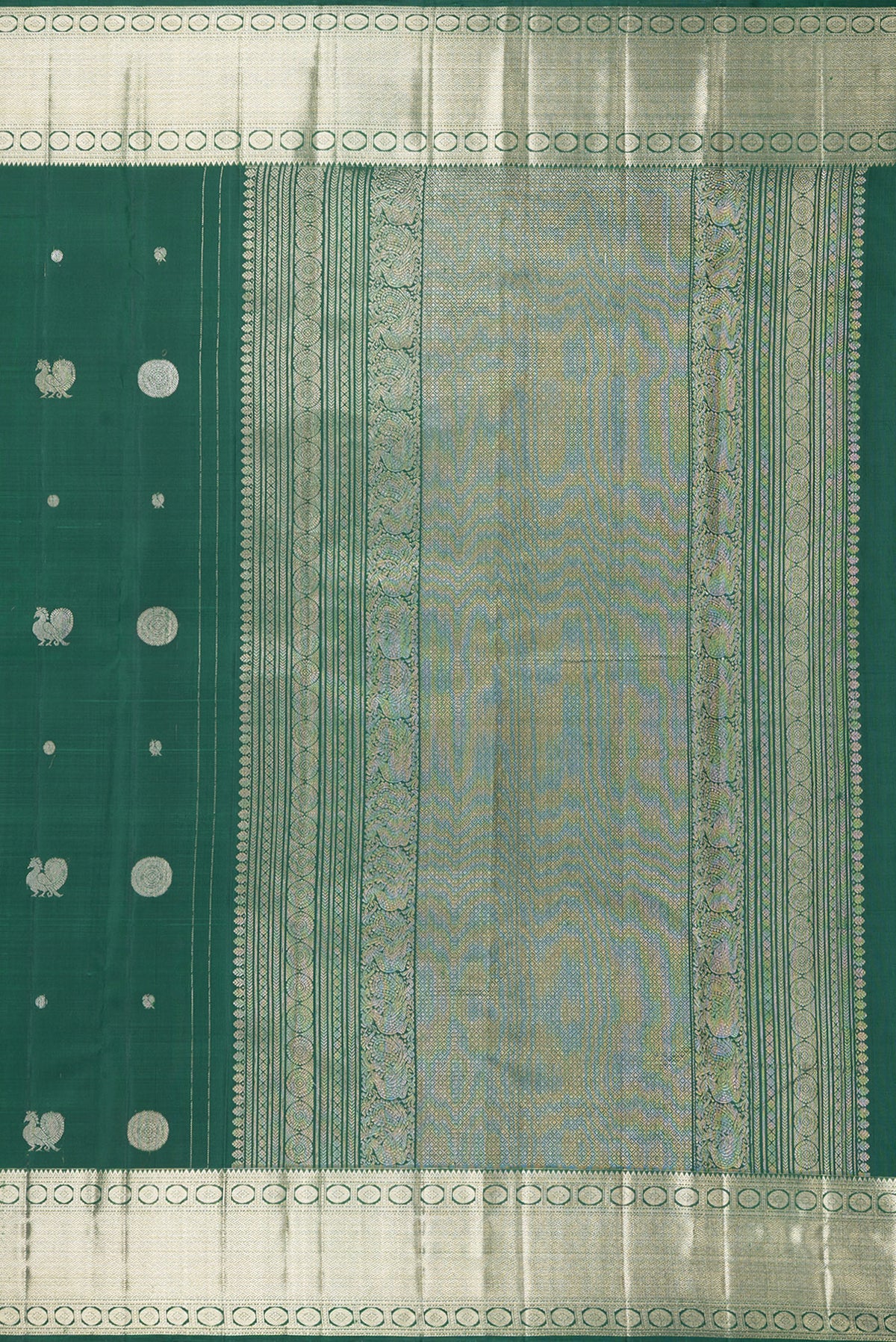 Close up image of the pallu of Pure Silk Bottle Green Kanjivaram Saree with Zari Butta on the body and Zari Border. 