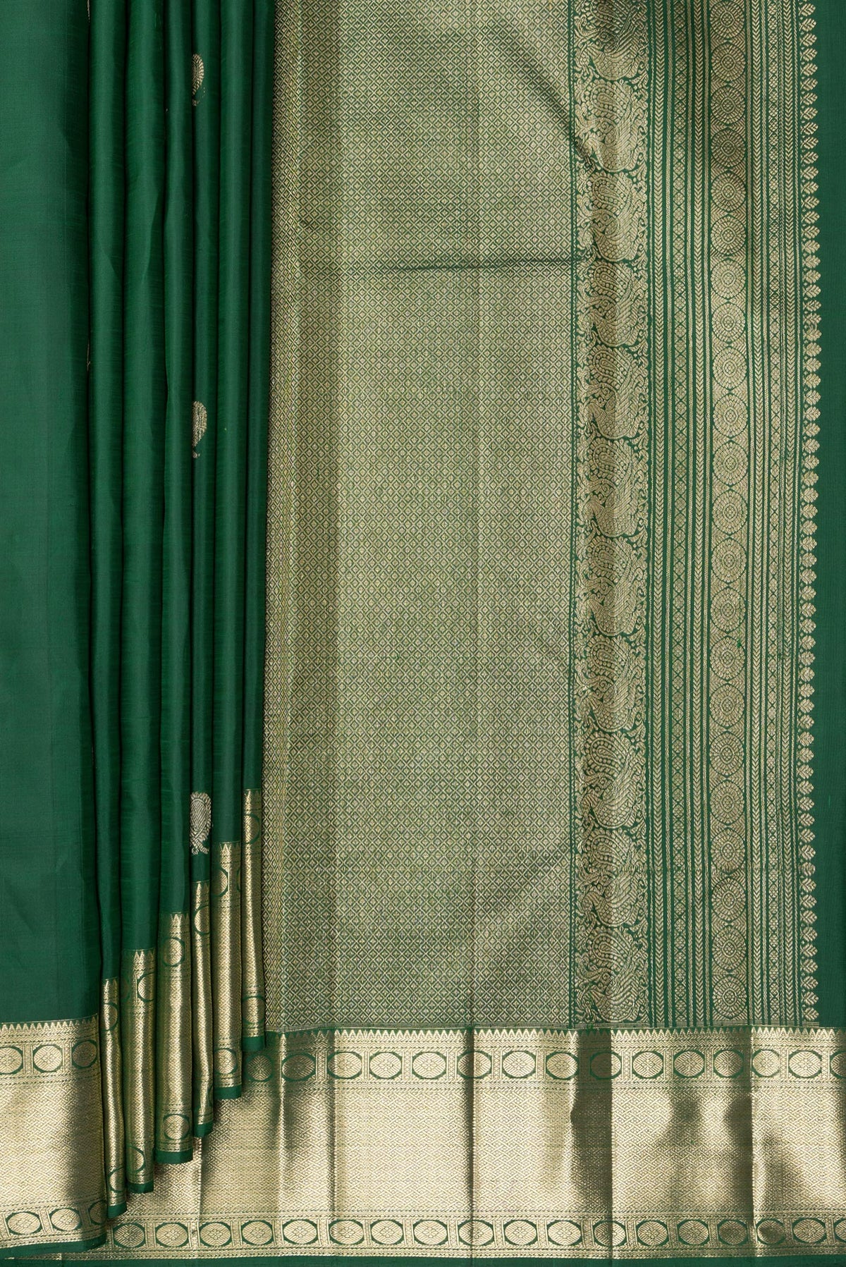 Pleats and pallu of Pure Silk Bottle Green Kanjivaram Saree with Zari Butta on the body and Zari Border. 
